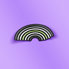 Rainbow sticker with the agenda pride colors, with rounded corners and a black outline. The background behind the sticker is purple.