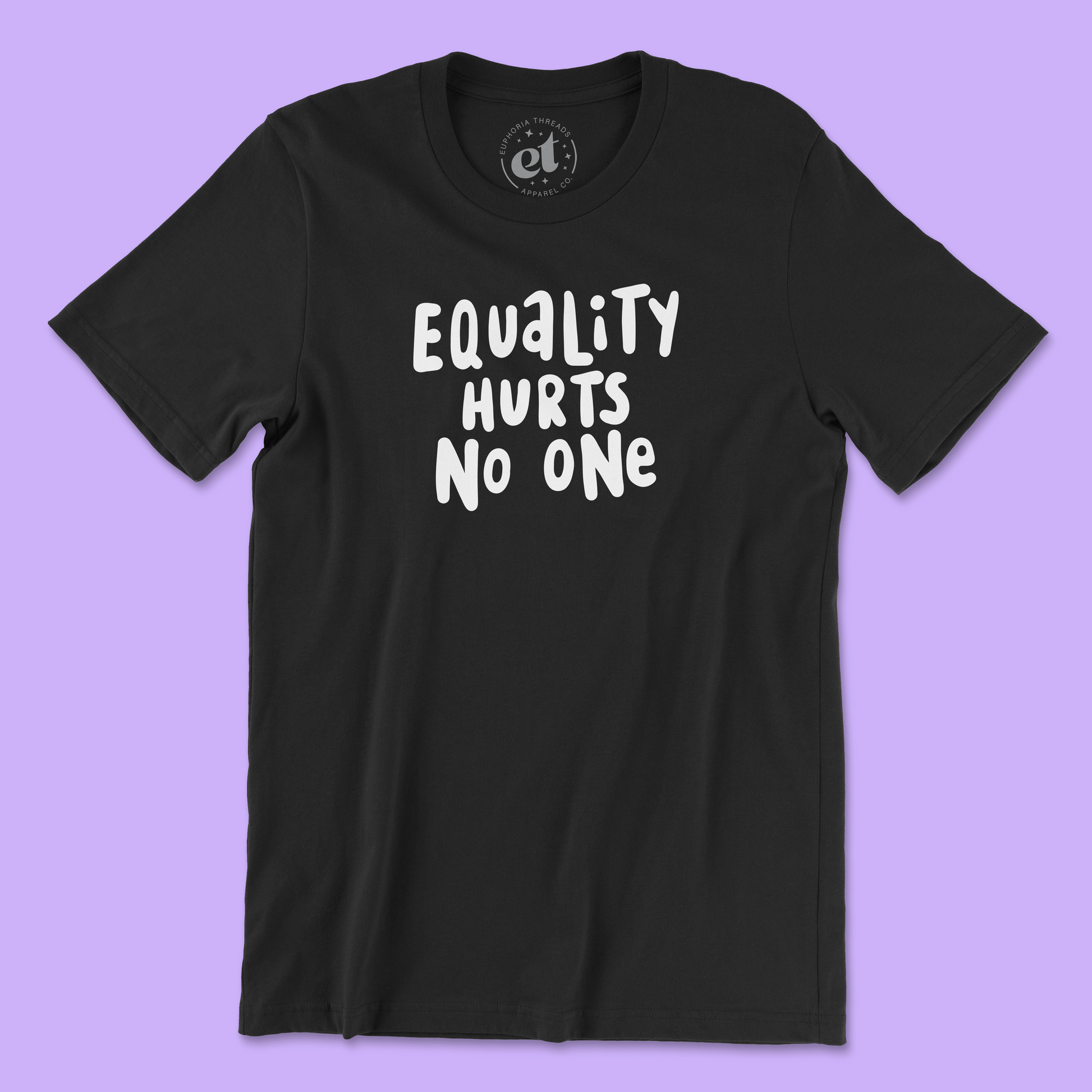 Black unisex 100% cotton LGBTQ pride tee with white text that says “Equality Hurts No One” in a bold, hand-lettered font. Background is light purple.