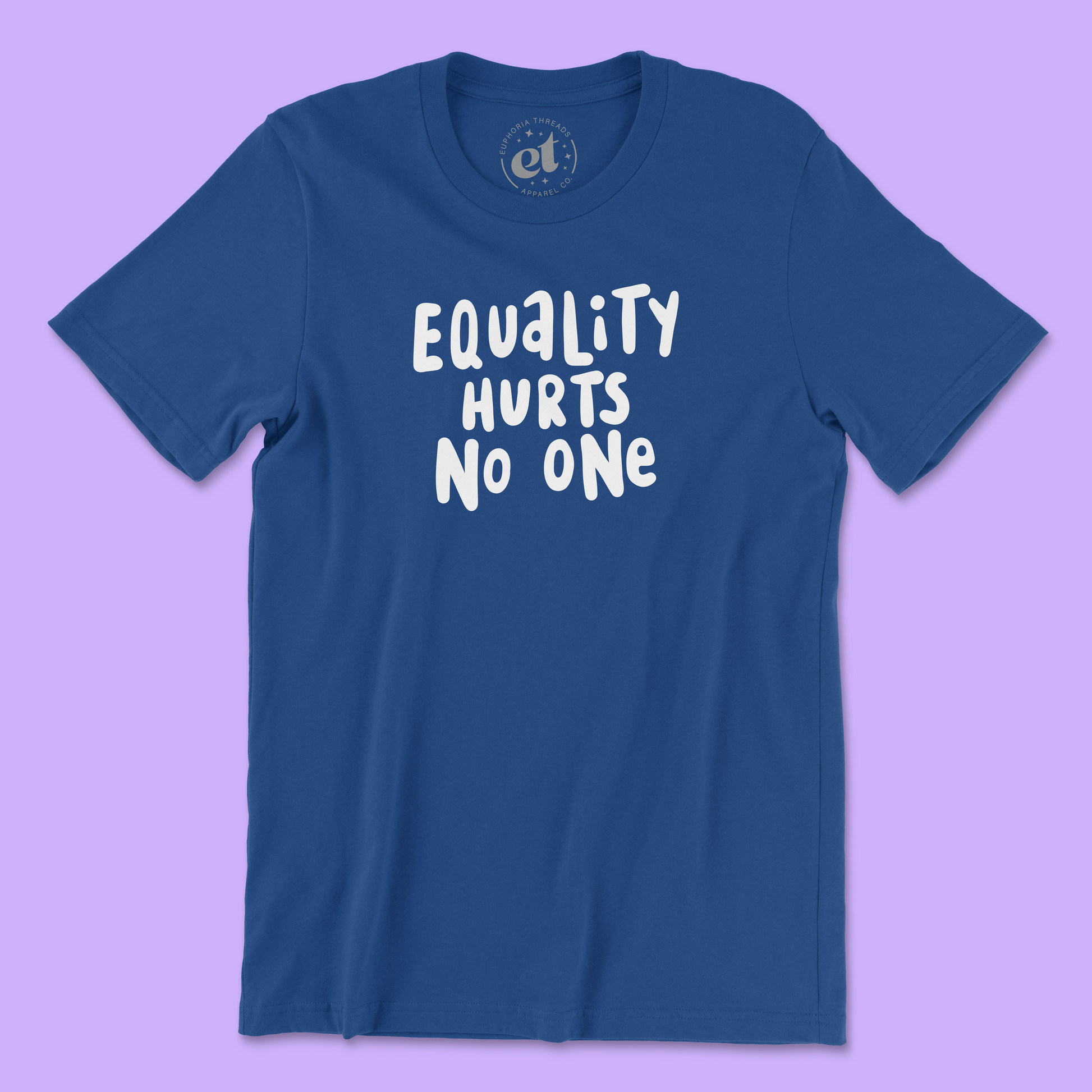 Royal blue unisex 100% cotton LGBTQ pride tee with white text that says “Equality Hurts No One” in a bold, hand-lettered font. Background is light purple.