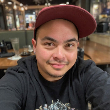 SJ Moecker (he/they)