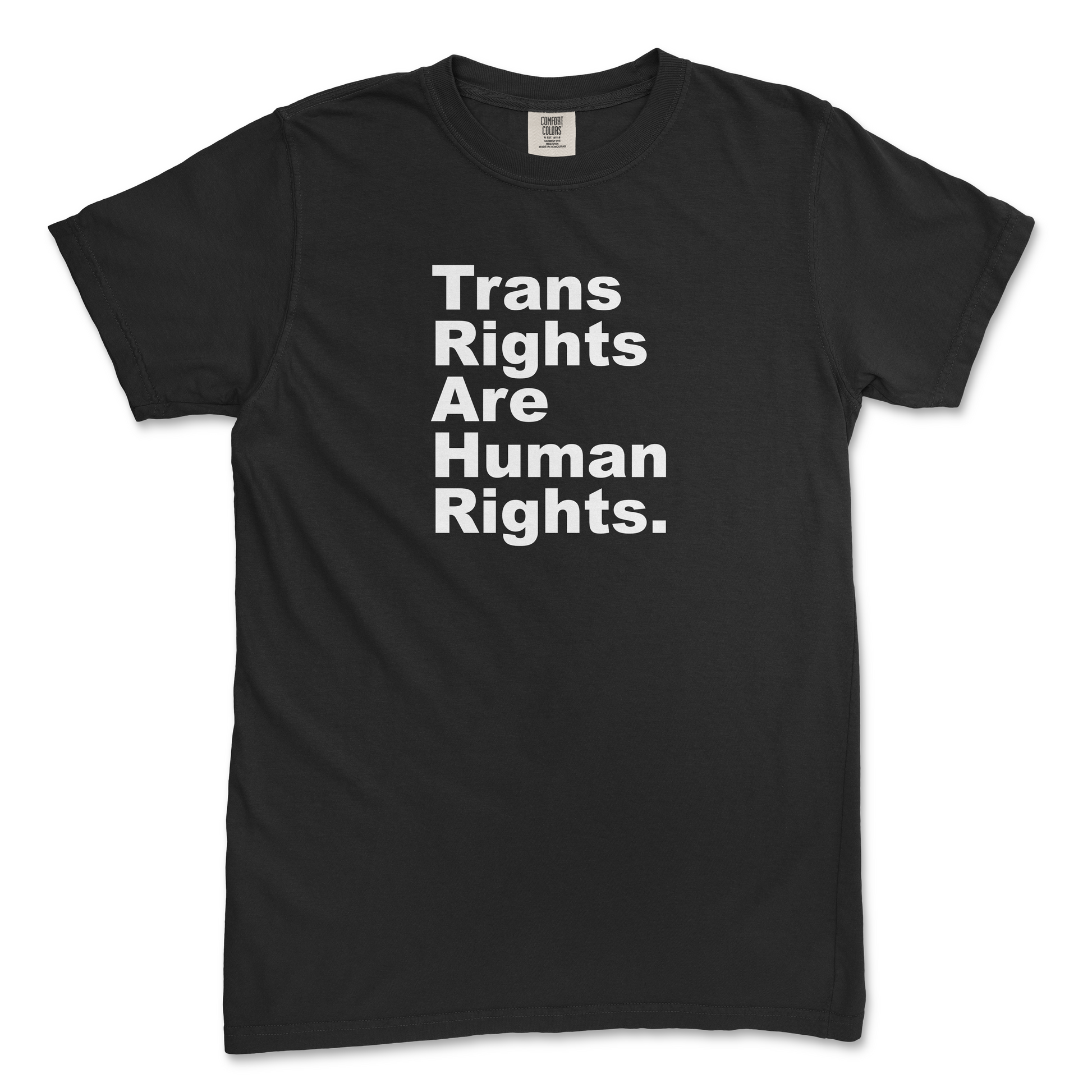 Black Comfort Colors tee with large white text that says "Trans Rights Are Human Rights" with each word on a separate line and left aligned. Background is white.